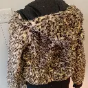 black and tan faux fur zip-up jacket with hood pockets pom-poms 3.webp