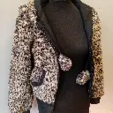 black and tan faux fur zip-up jacket with hood pockets pom-poms 2.webp
