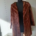 Vintage 1960s Brown real fur coat with button-up front and collar glam