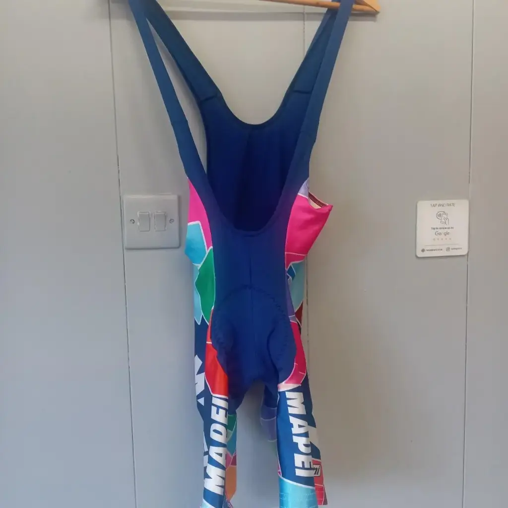 Blue and red Vintage 90s Mapei bib shorts
