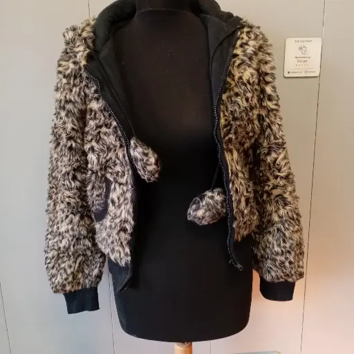 Black and tan faux fur zip-up jacket with hood pockets pom-poms Size 10