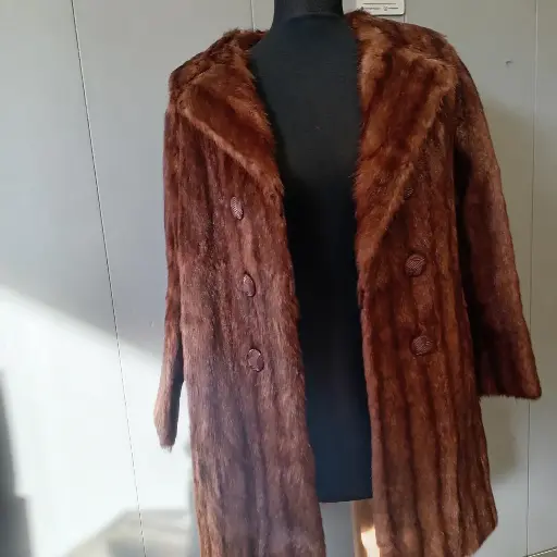 Vintage 1960s Brown real fur coat with button-up front and collar glam