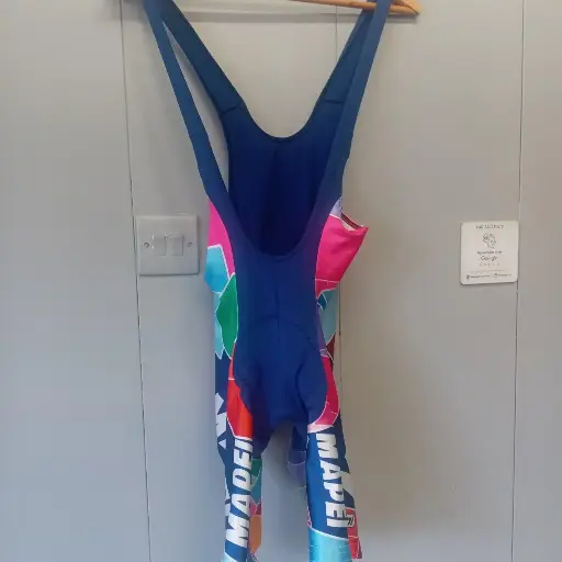 Blue and red Vintage 90s Mapei bib shorts